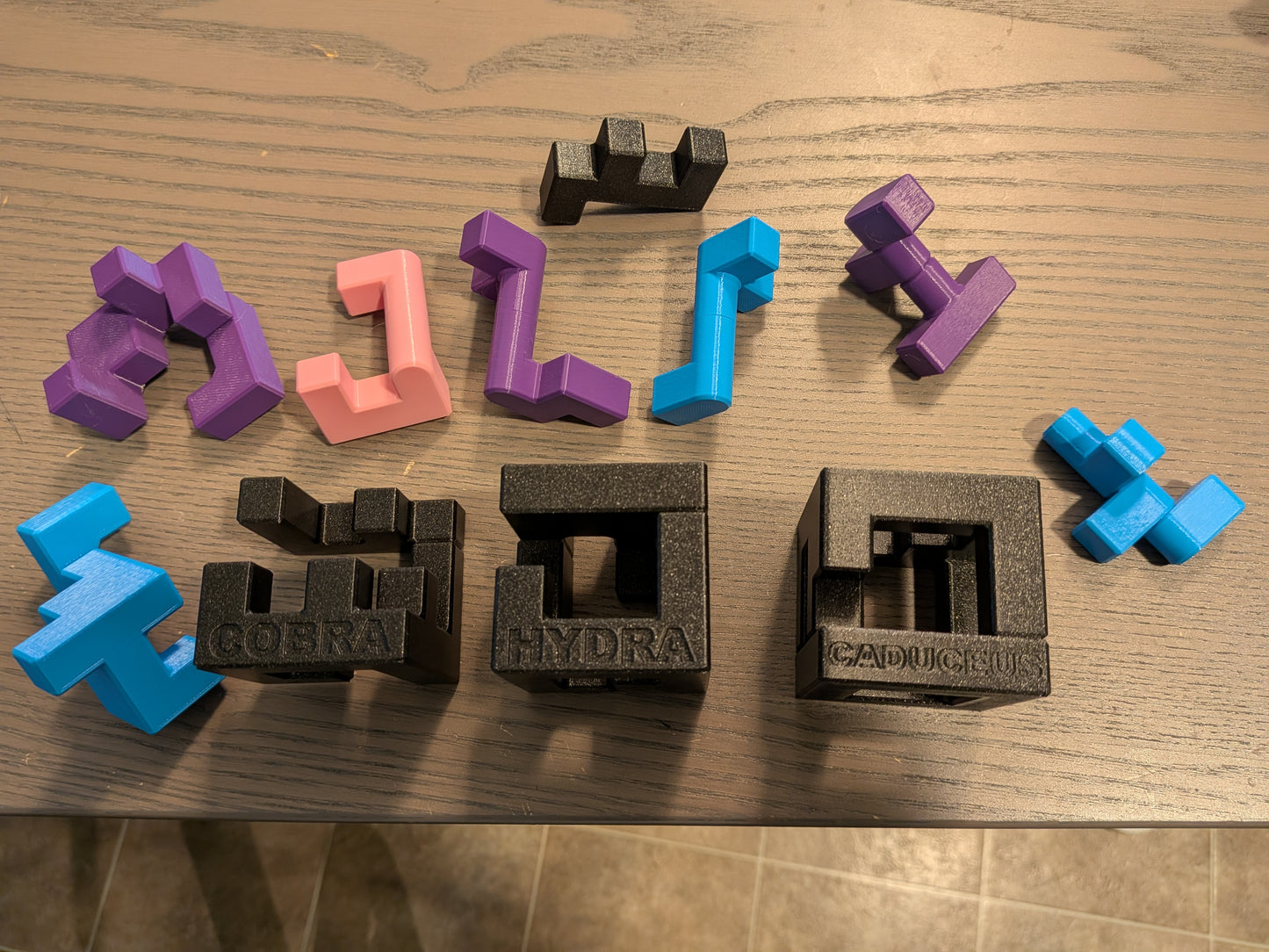 Cobra, Hydra and Caduceus - Turning Interlocking Cubes